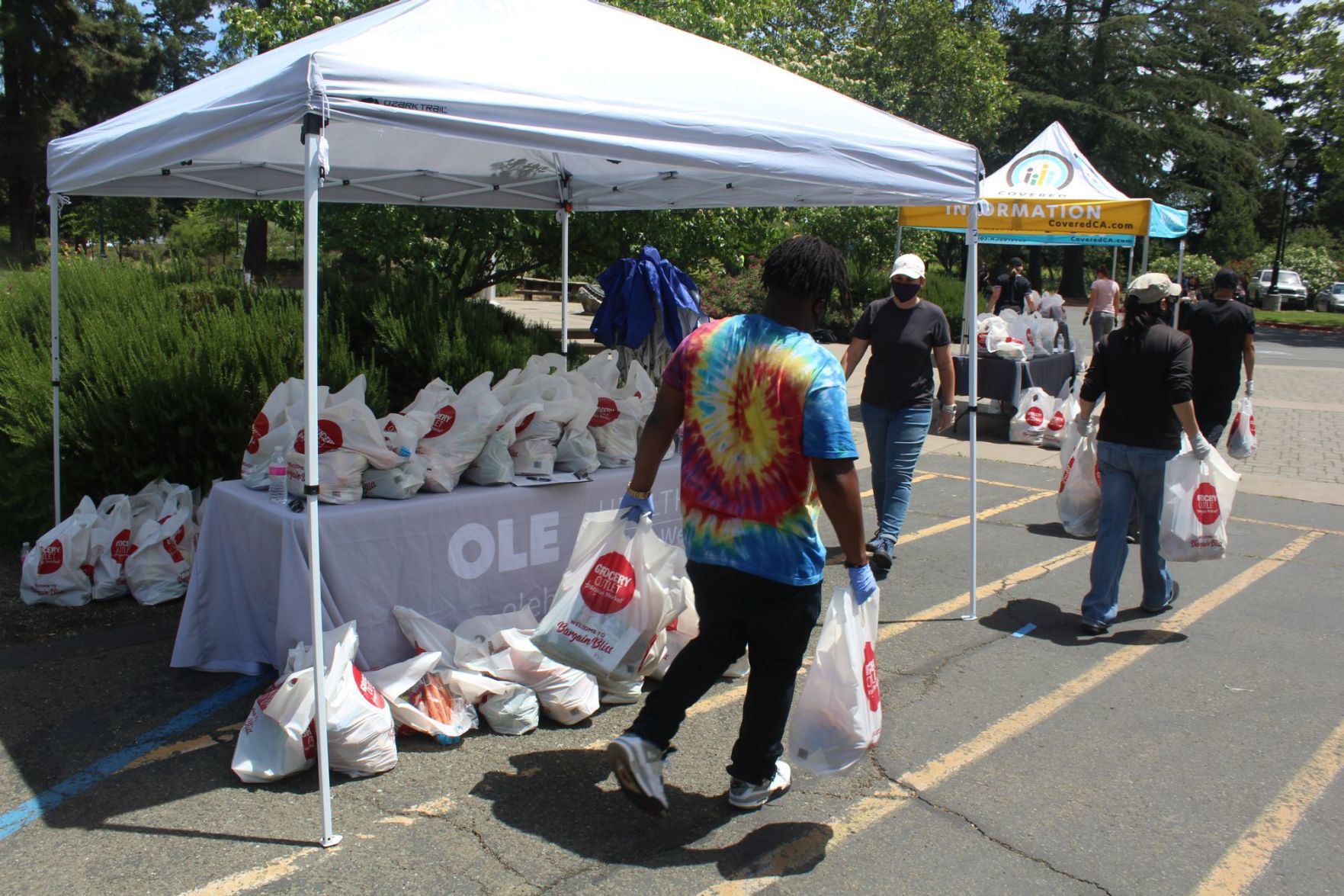 OLE Health hands out free food